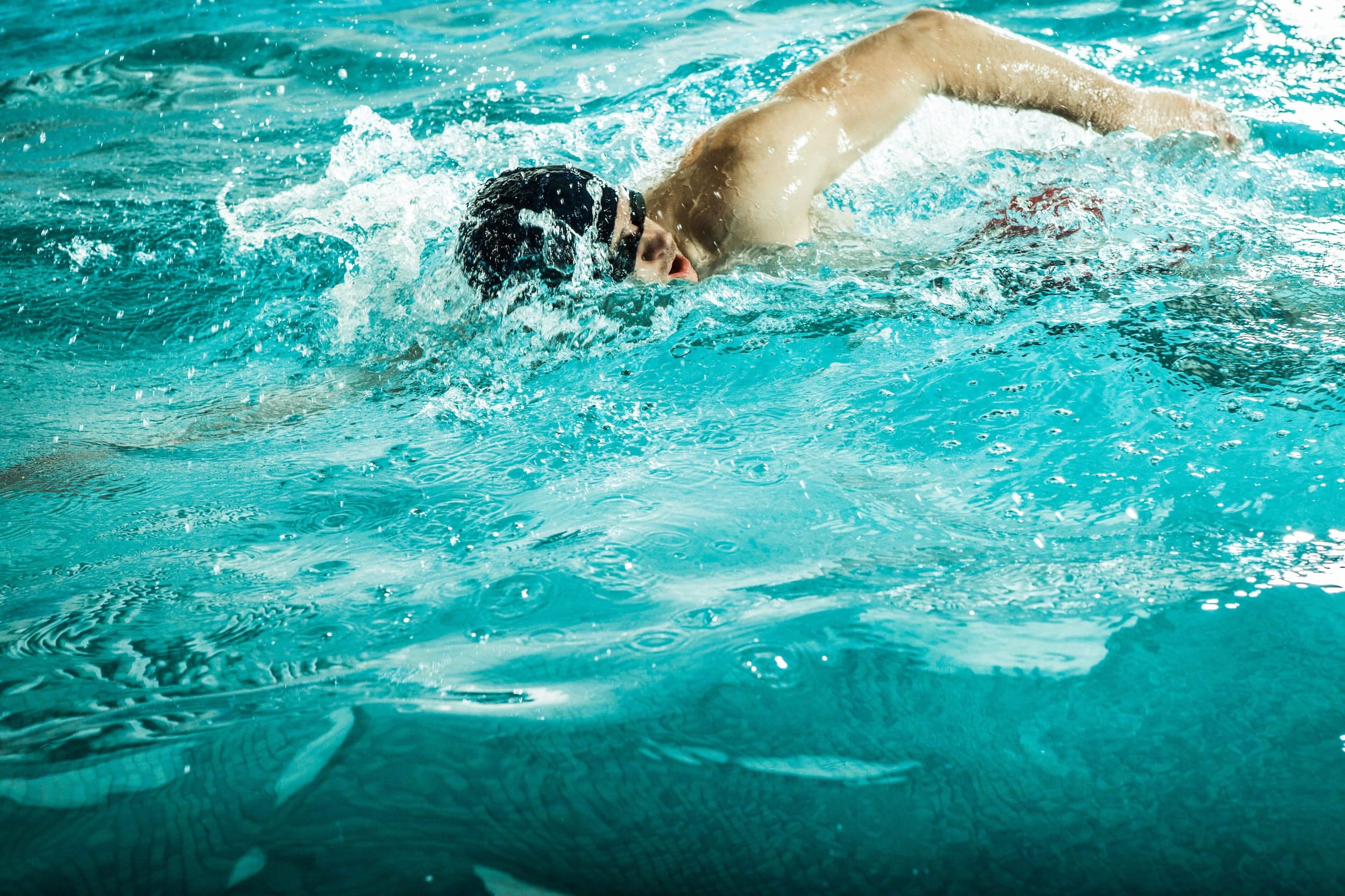 A man swimming in pool at Cape Kiwanda