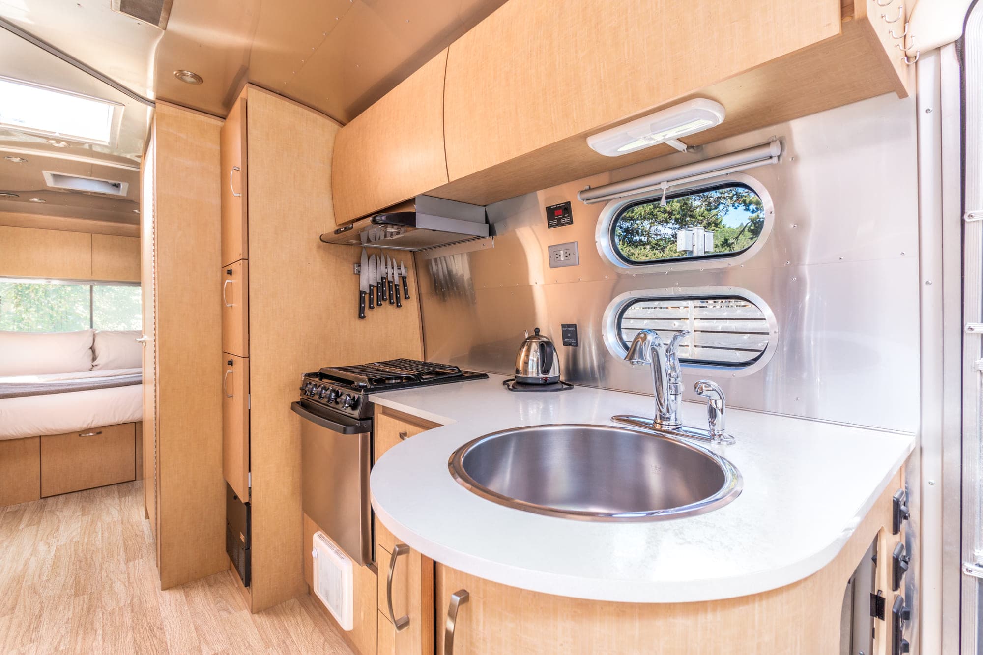 The kitchen area of a premium airstream at Harts Camp