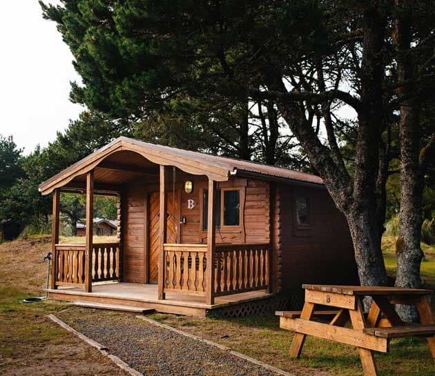 The exterior of a cabin at Harts Camp