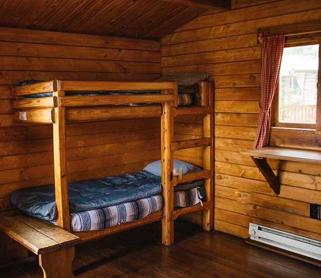 Bunk beds inside a cabin at Harts Camp