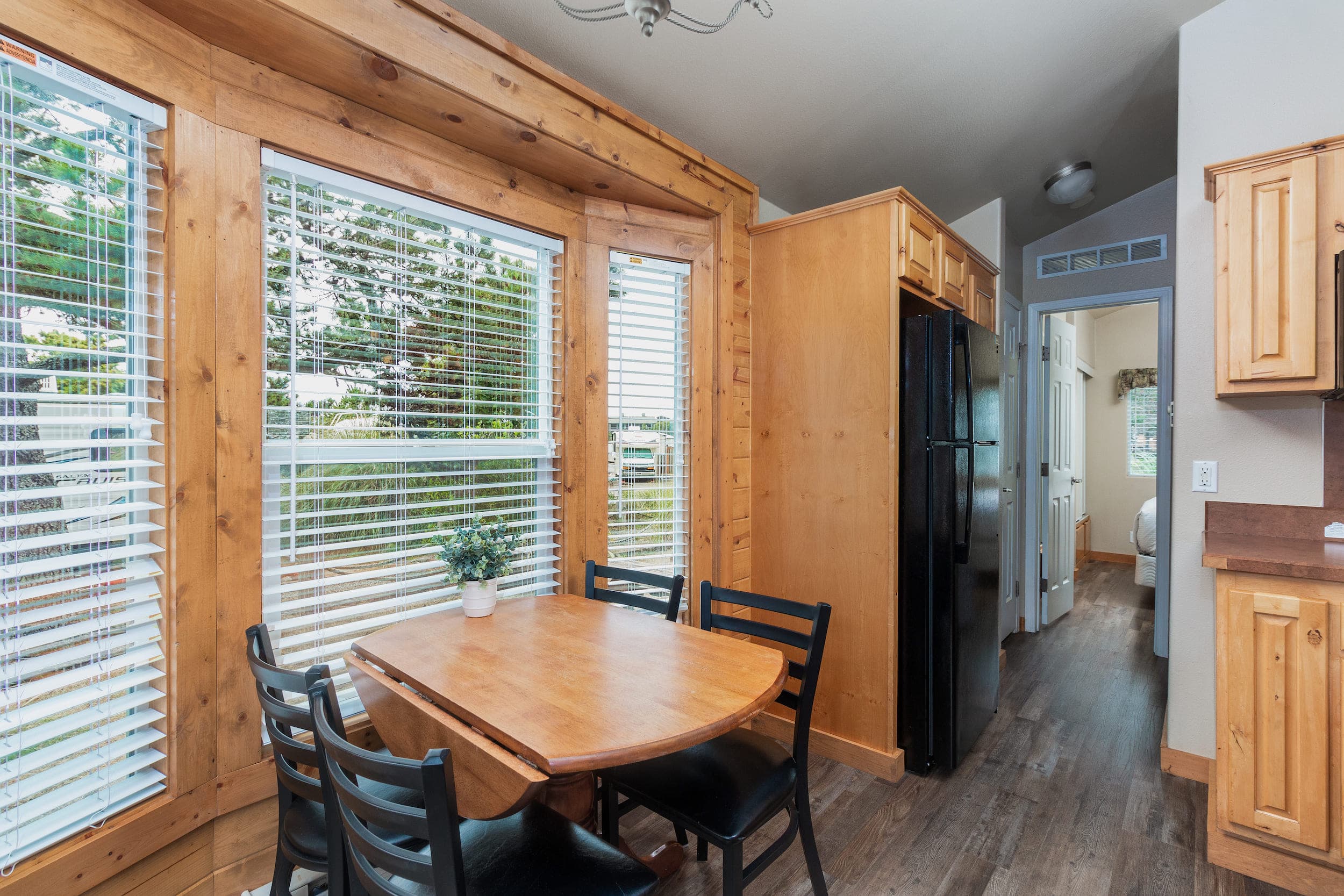 The dining area inside a cottage at Hart's Camp