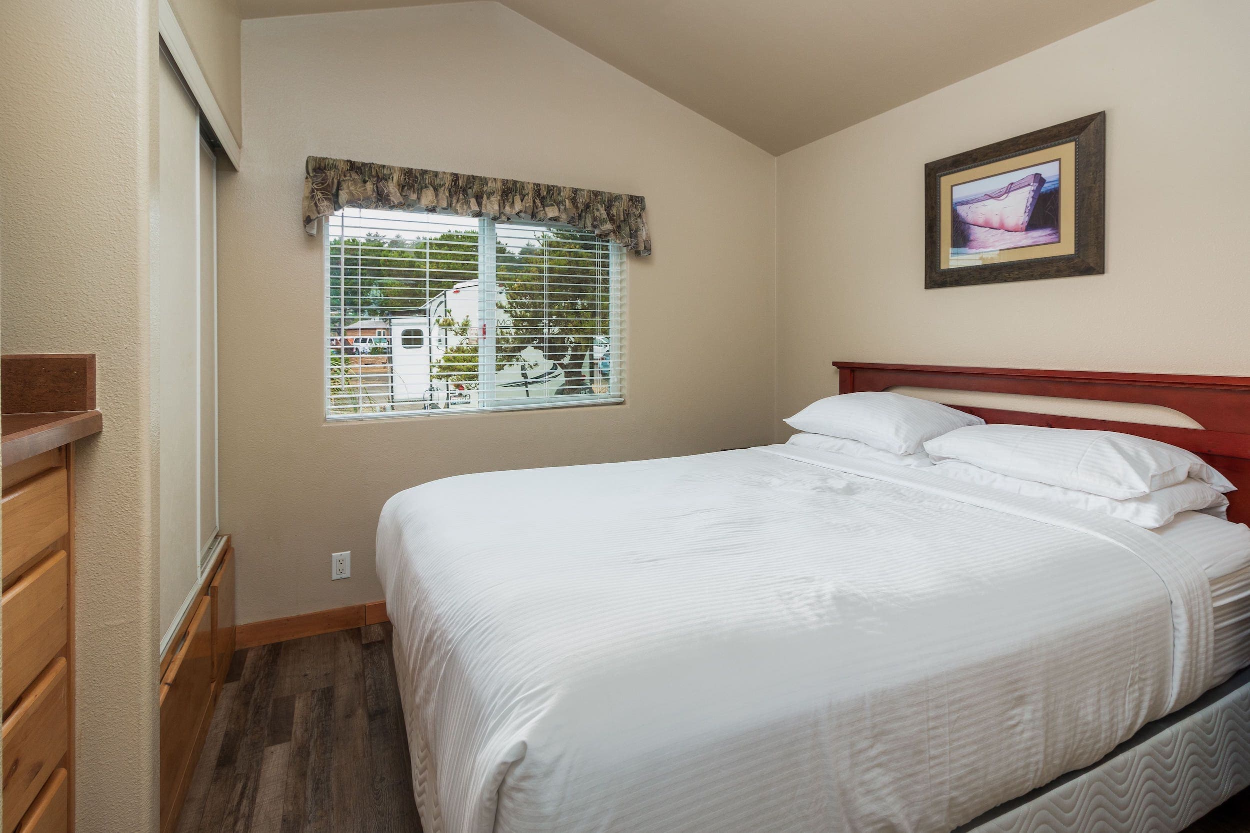 Bed inside an accommodation at Hart's Camp, Pacific City, OR