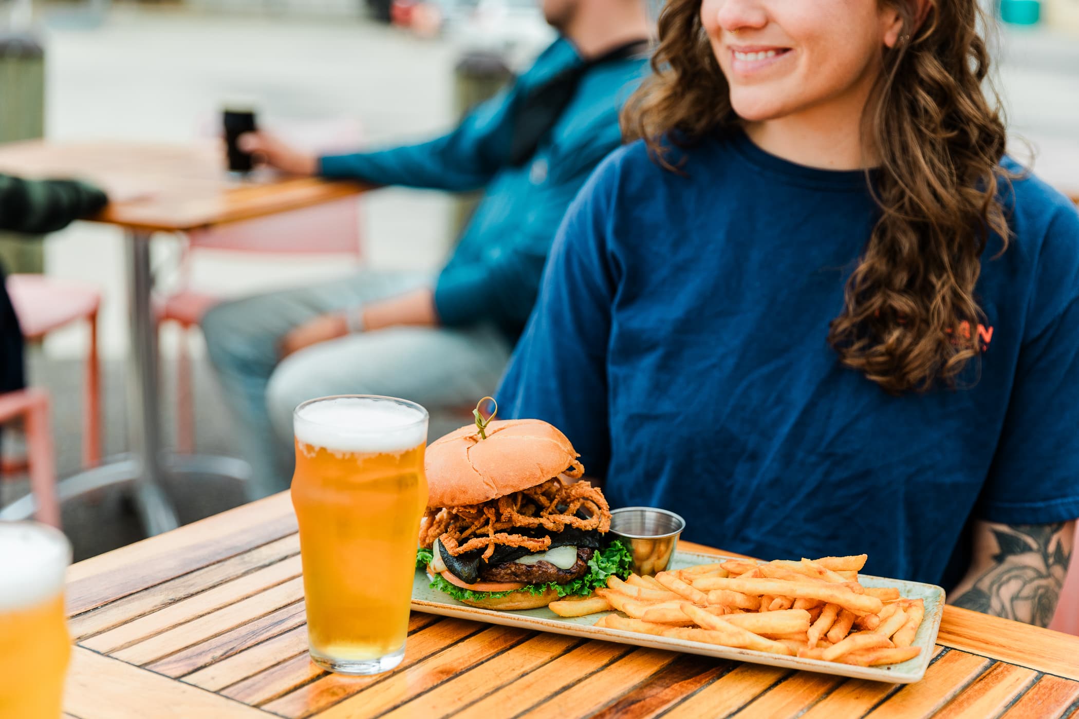People dining outdoors at a restaurant
