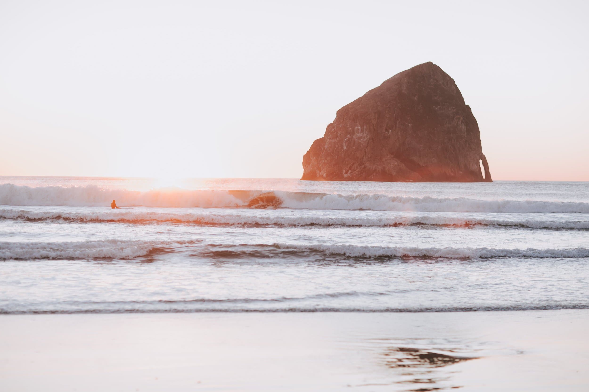 The ocean and a giant rock at Inn at cape Kiwanda