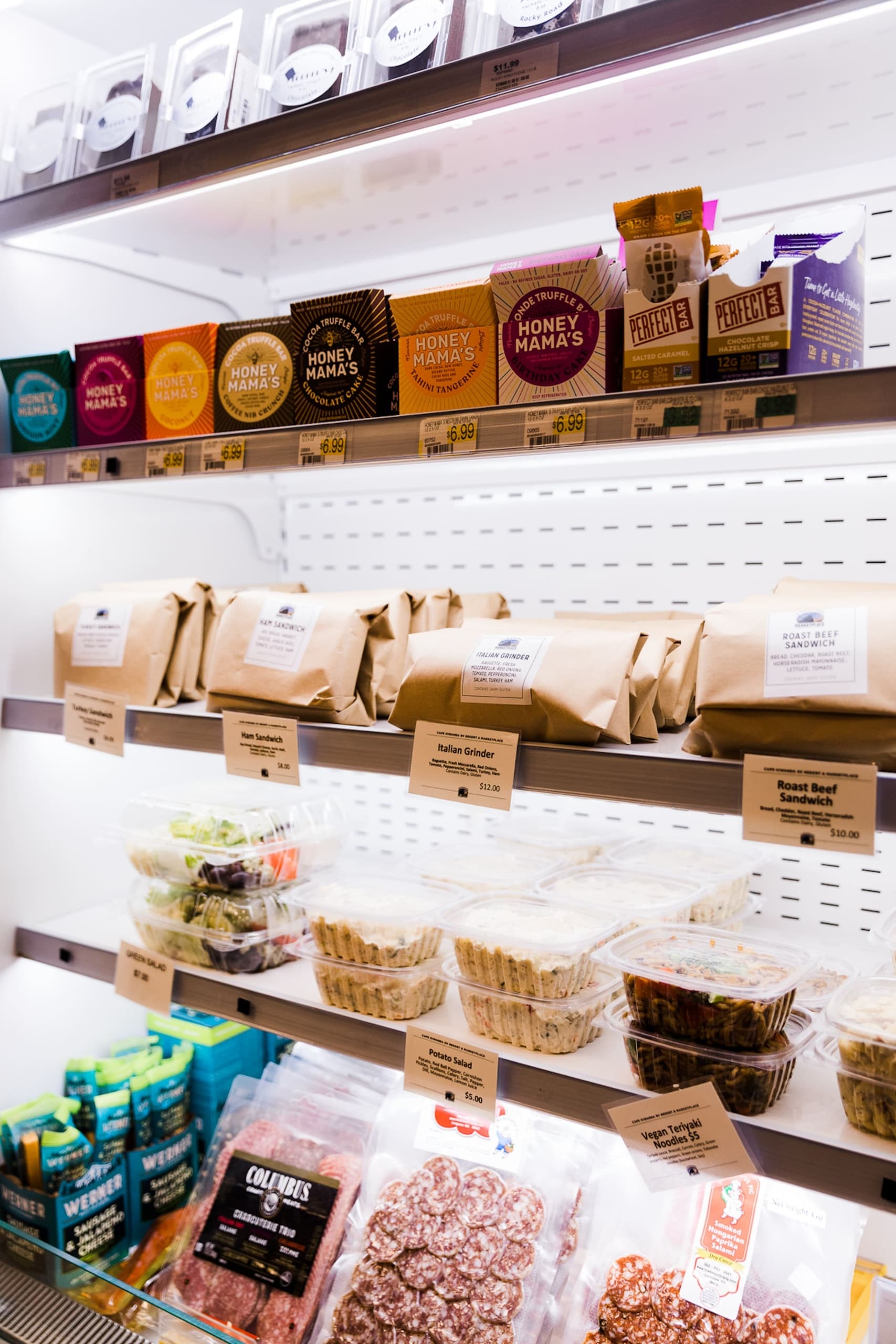 A refrigerated shelf at a grocery store