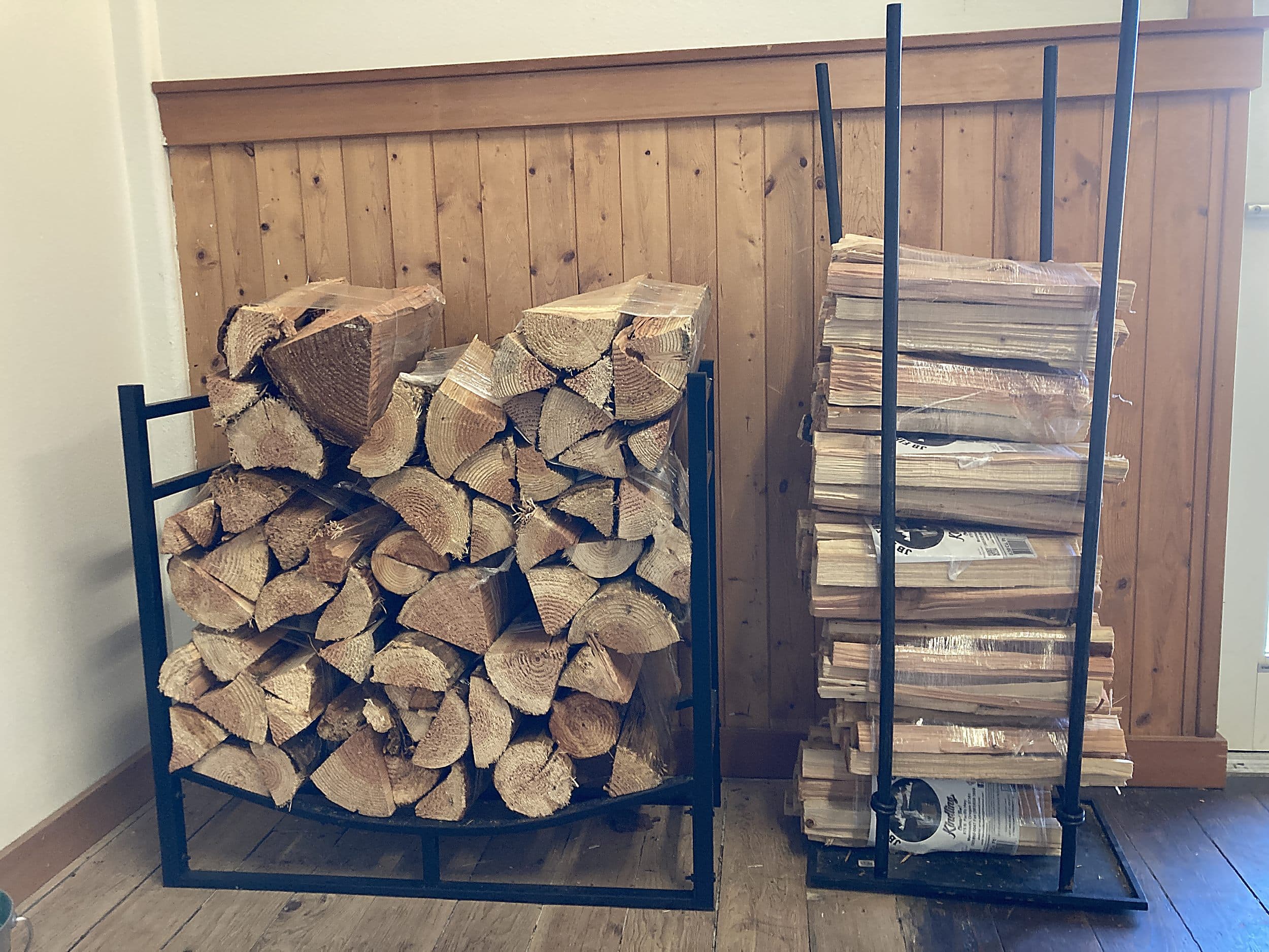 Firewood and kindling stocked for cozy fire pit evenings at The Inn at Hart's Camp glamping resort on the Oregon Coast