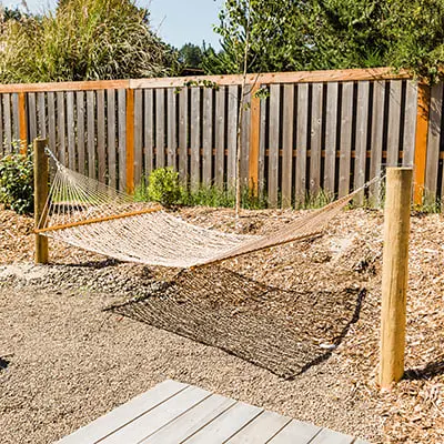 A hammock setup at an RV site at Hart's Camp