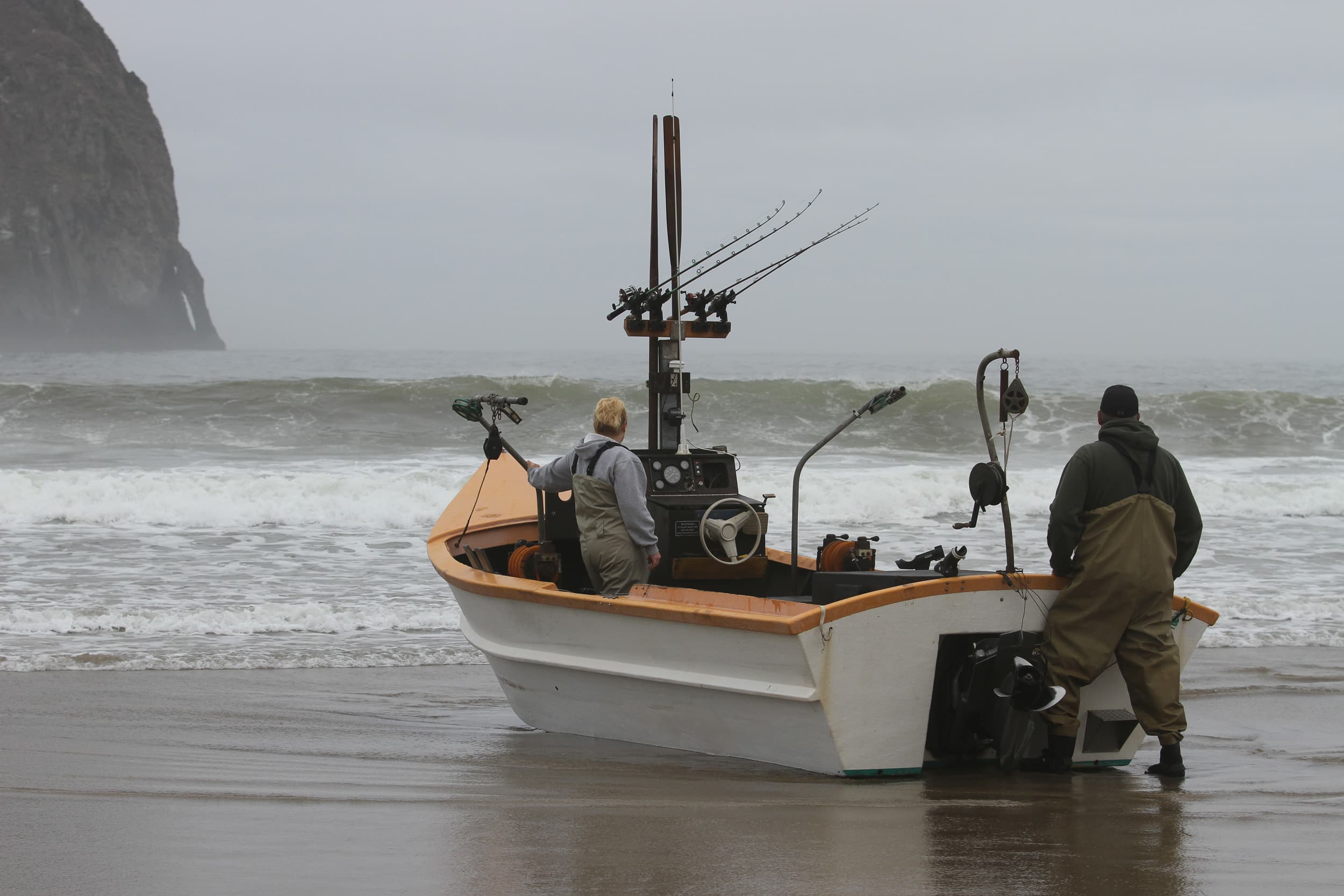 Two people on a fishing boat